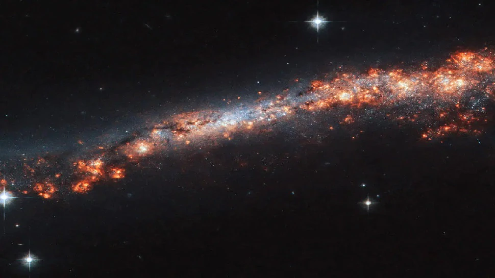 القوس-العملاق-الفريد-للمجرات-الممتد-على-3.3-مليار-سنة-ضوئية-في-الكون-قد-يغير-النظرية-القديمة